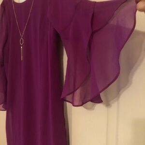 Purple dress from Macy never been wore still have tags attached